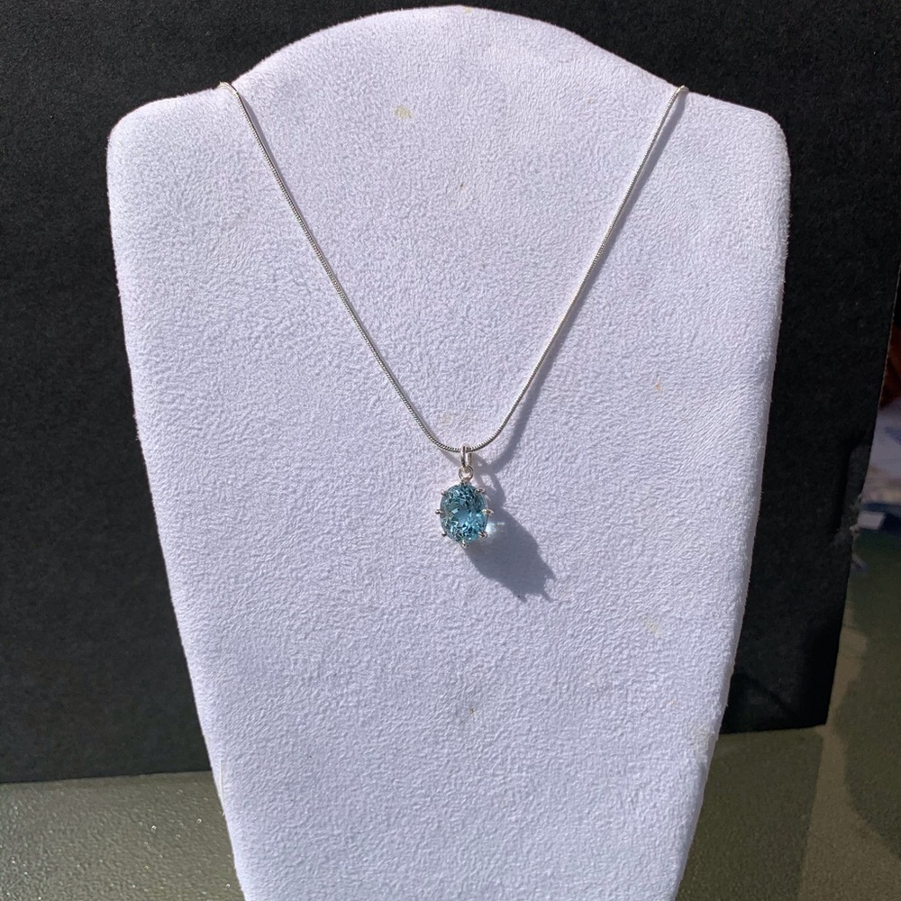 Blue Topaz Pendant With Silver Chain